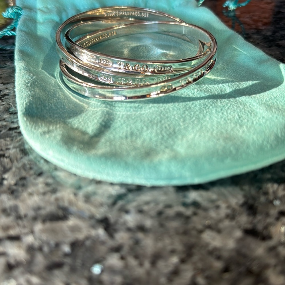 Extremely rare gorgeous authentic Tiffany & Co triple interlocking bracelet.